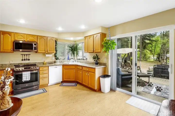 Kitchen with sliding glass door access to backyard patio