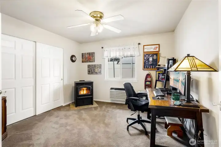 Office or flex space with natural light and pellet stove
