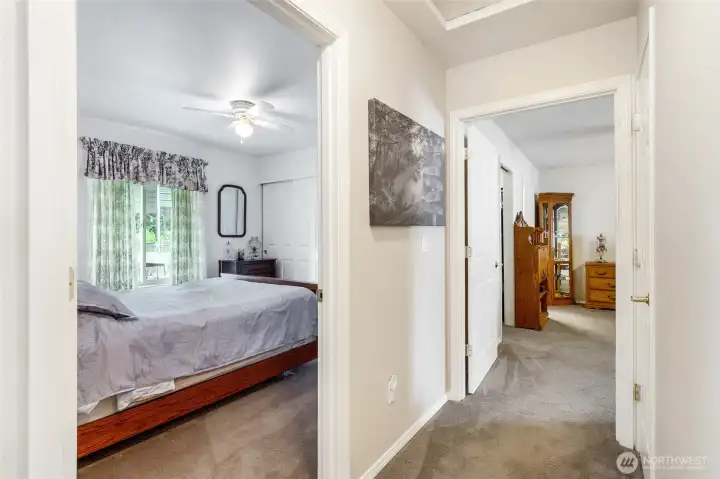 Interior hallway with access to multiple rooms