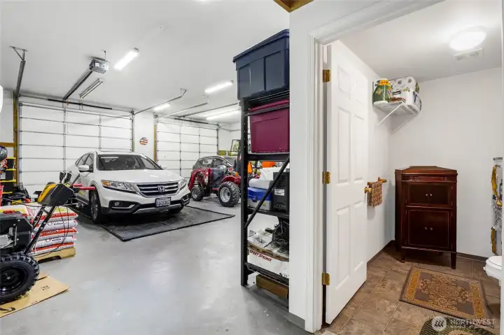 Shop storage area with shelving and bathroom
