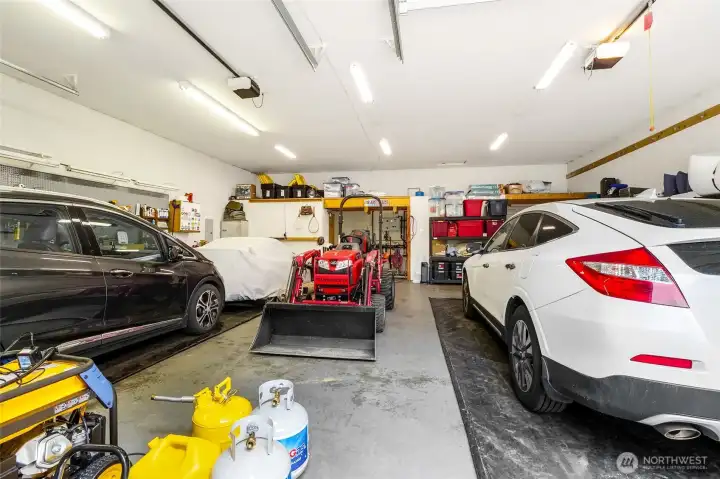 Shop interior showing multiple bays and overhead lighting