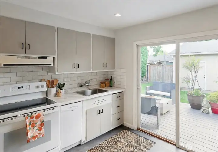 Kitchen Overlooking the Backyard and Deck