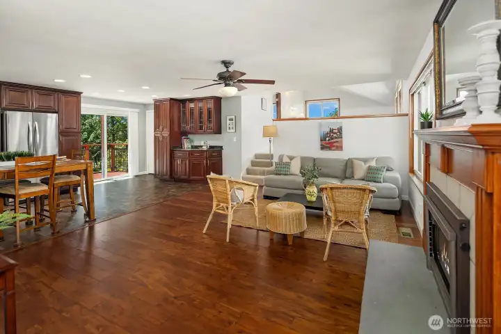 Open living and ktichen. Removing the wall between the living room and kitchen created a bright, connected main level with an open, welcoming feel.