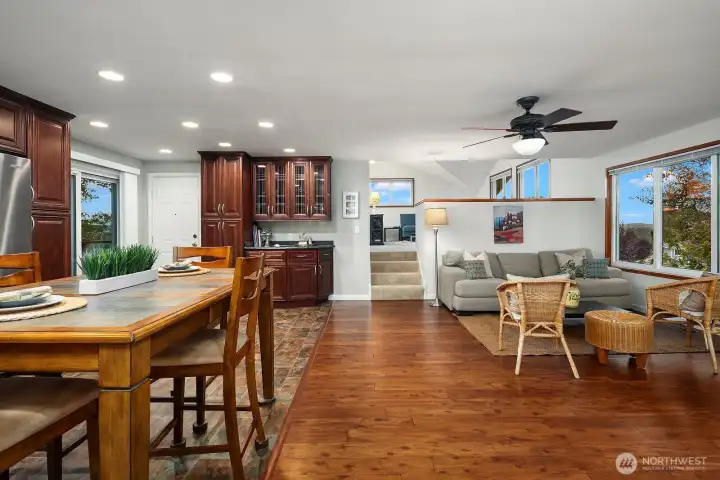 Vaulted ceilings, multiple triple-pane windows, and territorial views make this upper-level bonus room a bright and versatile retreat.