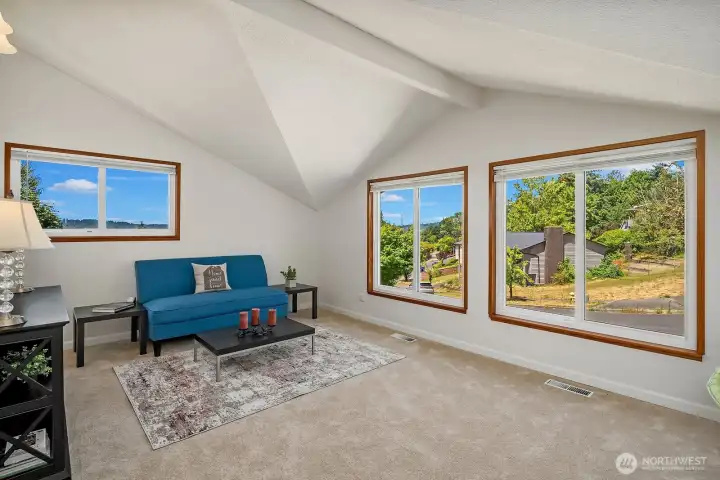 This expansive flex space offers room for a media area, home office, playroom, hobbies, or an additional gathering space.