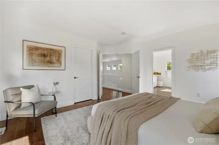 Double door entry to Primary Bedroom. It has a large walk-in closet and 5-piece bath.