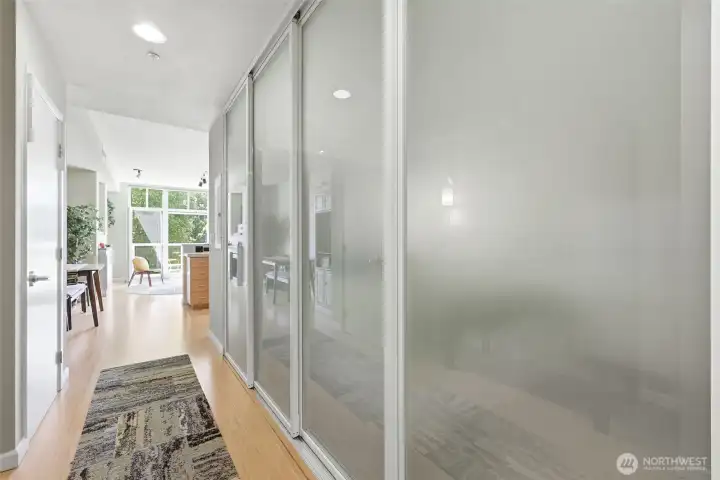 Newly installed sliding doors from The Sliding Door Company close off the bedroom completely for privacy.