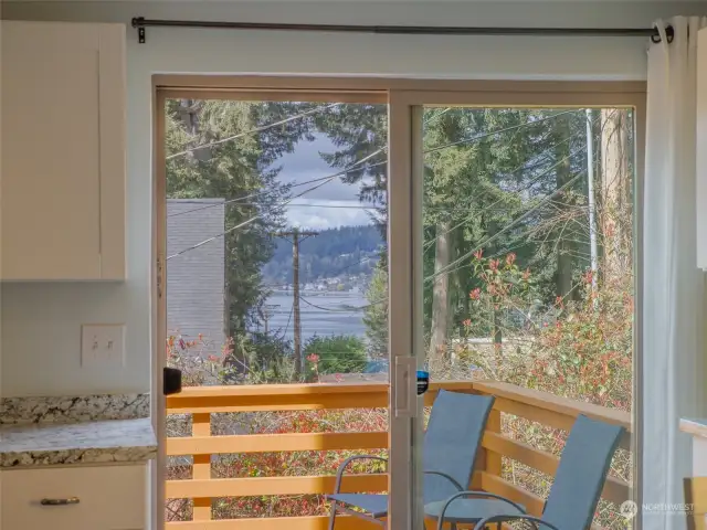 Enjoy the partial view of Henderson Bay from the kitchen and back deck