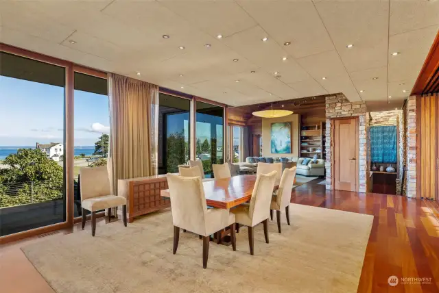 Up to dining area, living room in the background.  Stairs to the right lead to Creativity Cove.