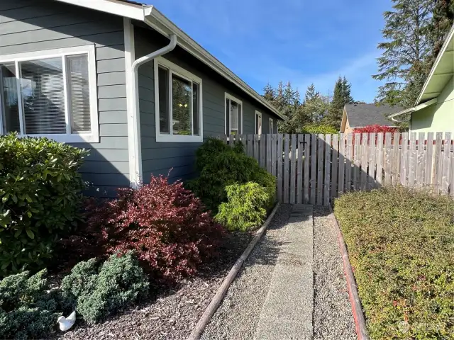 Professionally landscaped yard is easy care for year around enjoyment!