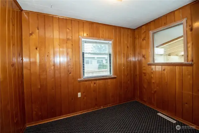 3rd Bedroom - wonderul wood paneling and argyle carpet pattern