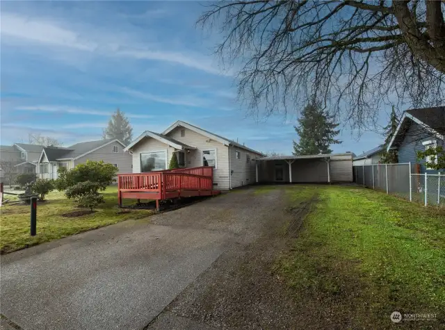 Plenty of parking - RV, carport and barn door to garage