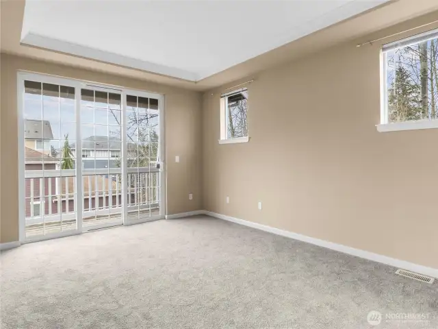 primary bedroom with coffered ceiling