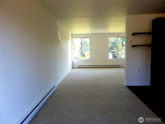 Dining area looking into living room