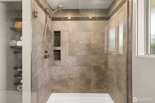 Reed glass window for privacy when taking that extra long shower. Home also has a hot water recirculation pump.