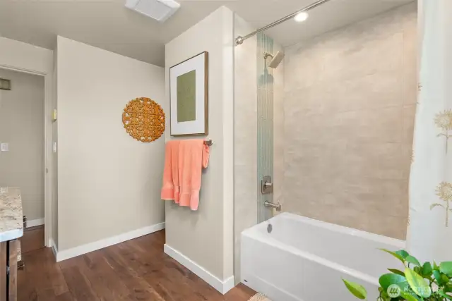 Lots of thought was put into the choices of finishes. Love the glass detail. What you DON'T see in this photo? A closet with custom shelving, electrical outlets and more.