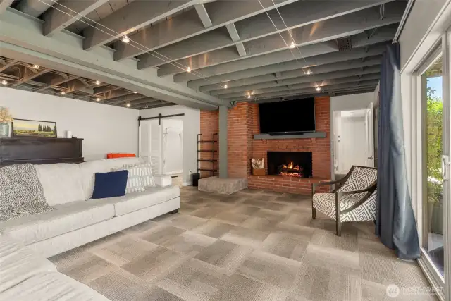 Imagine game game night with your friends here. The gas fireplace is the stunning focal point of this room.