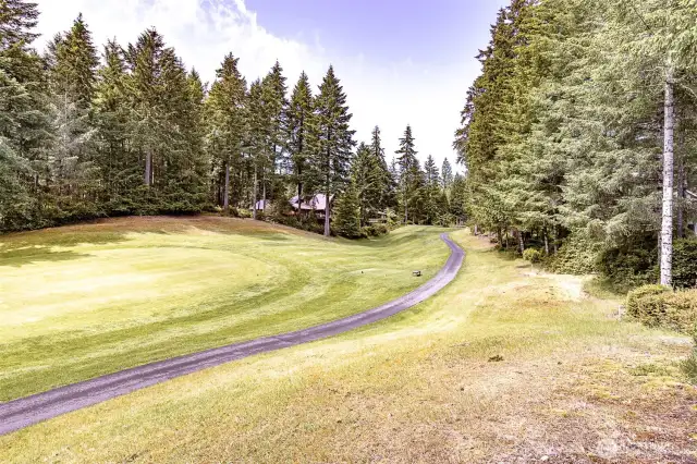 view from the yard to the 11th hole tee boxes.