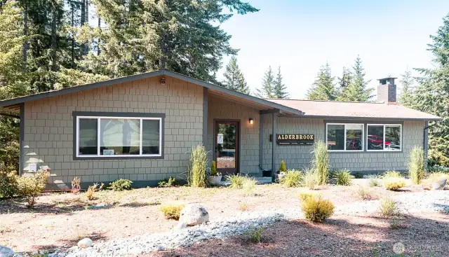 across from the clubhouse is the community center for meetings, socializing, and includes a library