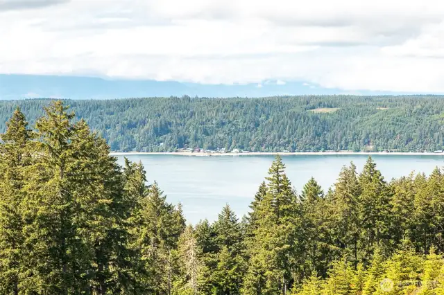 across from the clubhouse is the Pointe with a magnificent water, Olympic Mountains, and territorial view.