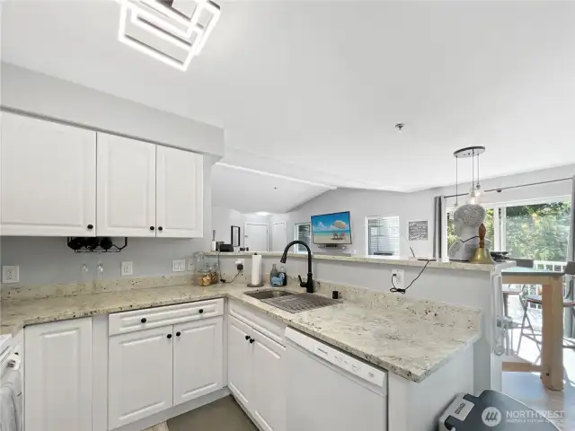 You'll love the gorgeous countertops in this lovely kitchen.