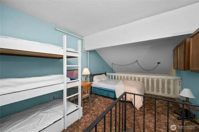 Space enough for queen bed and bunk beds!