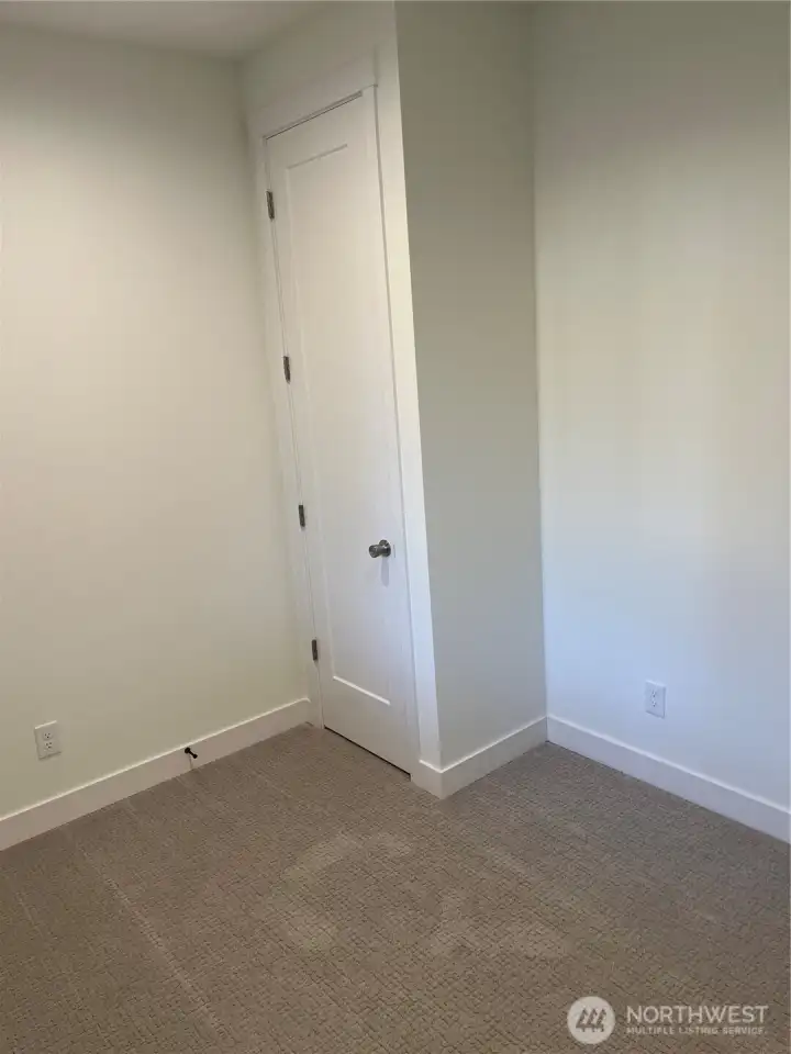Spacious office/den with closet and large window