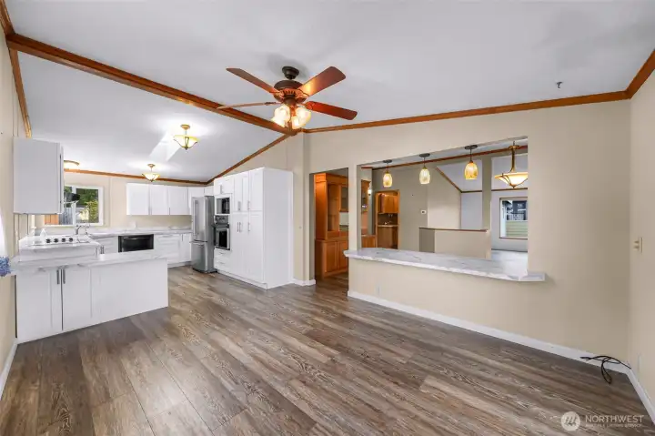 This generous flex space could be used for your dining area, hobby area or even a formal sitting