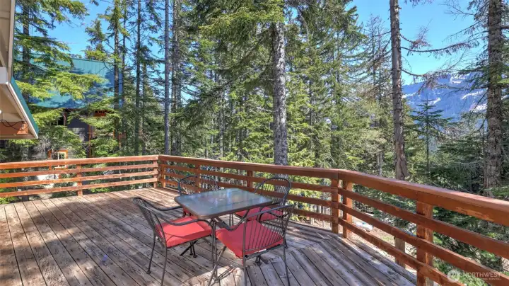 Enjoy spectacular views of Rampart Ridge and Chikamin Peak while you relax on the spacious deck.