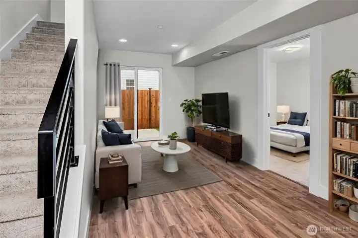 Spacious living area on the ground level. Virtually staged.