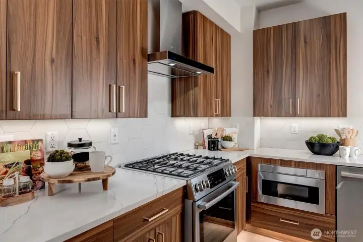 Kitchen includes Bosch and Sharp appliances and built in microwave