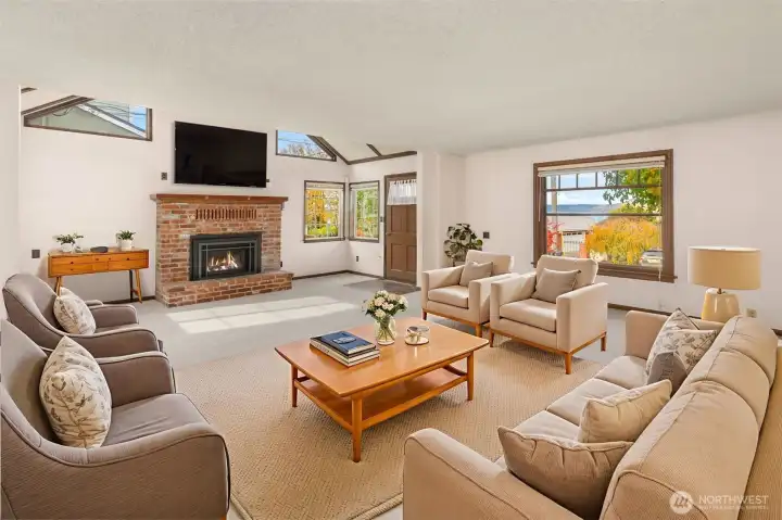 Spacious living room with water views. *Virtually staged*