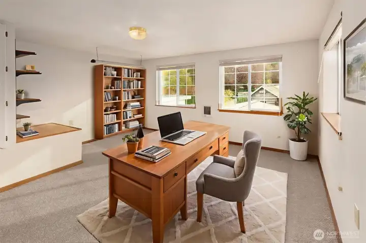 Large room adjoining the primary suite. Perfect for home office or large closet. *Virtually staged*