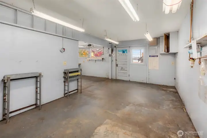 835 sq ft detached shop with power.