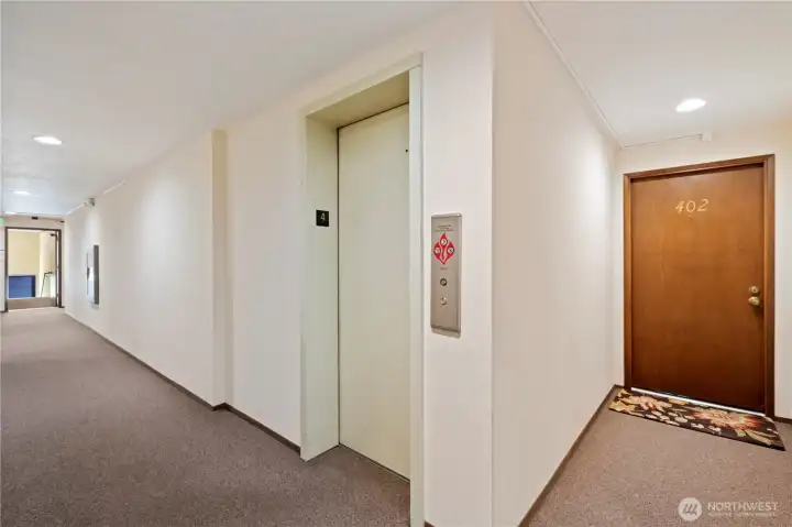 Elevator is right around the corner from the unit