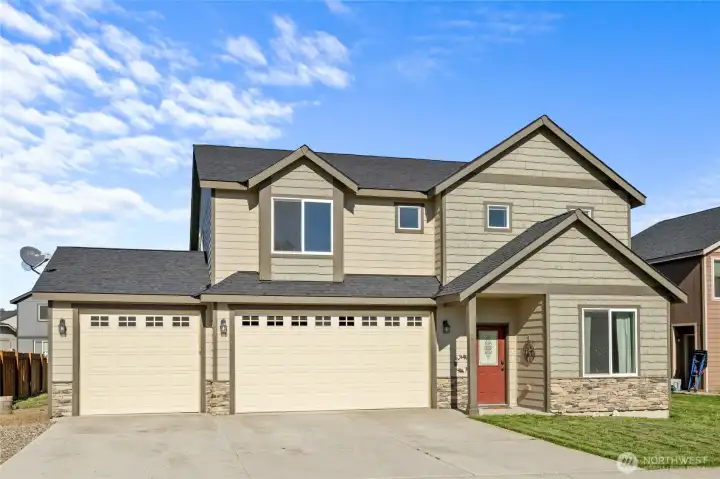 This beautiful 2015 home with 3-car garage is filled with curb appeal!