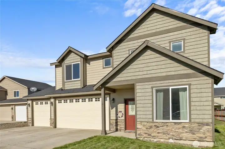 This beautiful 2015 home with 3-car garage is filled with curb appeal!
