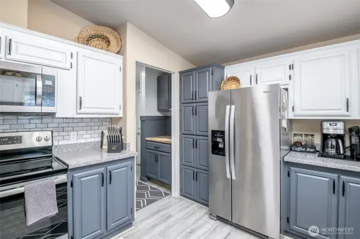 Corian countertops & exceptional storage for food and appliances.