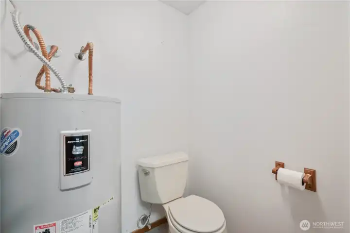 1/4 bath off laundry room on garage level