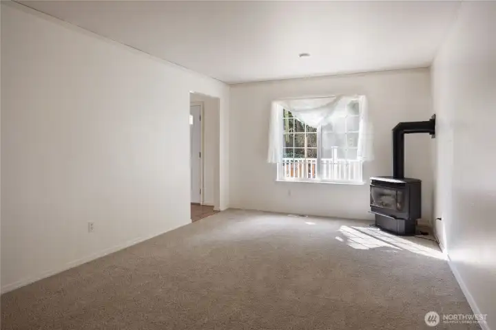 Living room with free standing natural gas fireplace