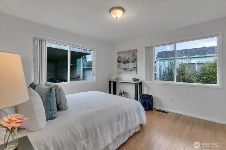 Bedroom with 2 large closets and custom shelving