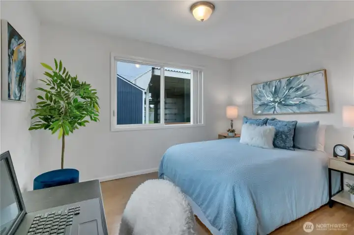 Bedroom 3 with large closet and custom shelving