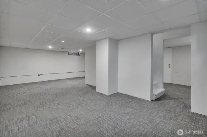 Finished basement with potential for bedroom, bathroom, and office