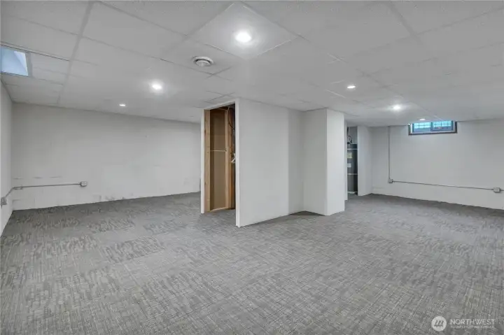 Finished basement with potential for bedroom, bathroom, and office