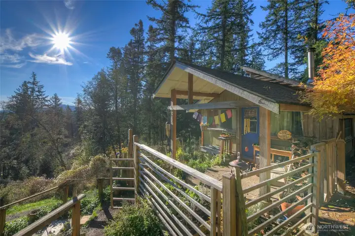 Main cabin perched oon a sunny knoll