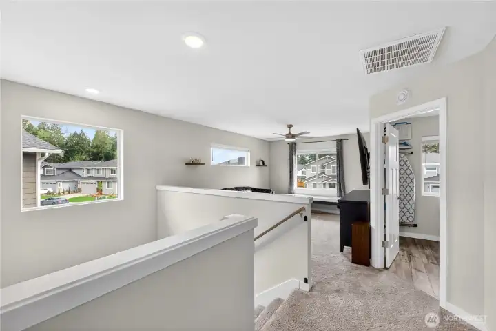 Lots of room upstairs including the bonus loft at the top of the stairs