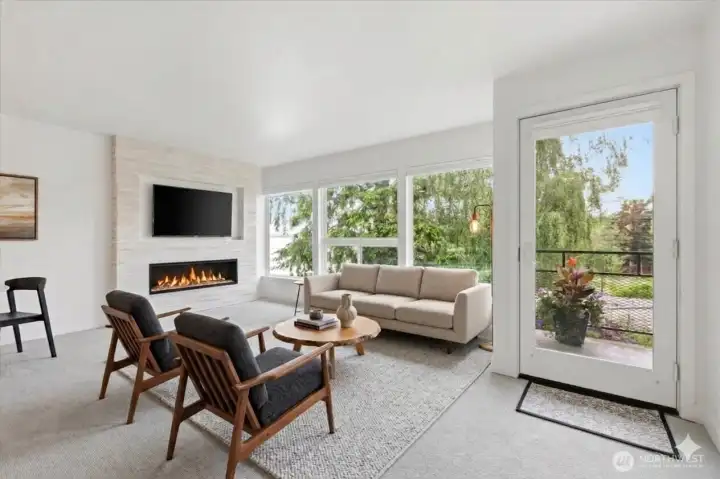 Virtually staged photo of living room with fireplace
