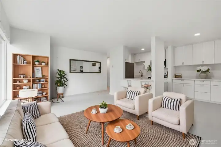 Virtually staged photo of living room looking back toward entry
