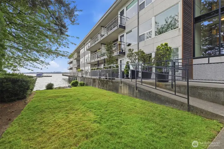 Private beach for residents grassy area