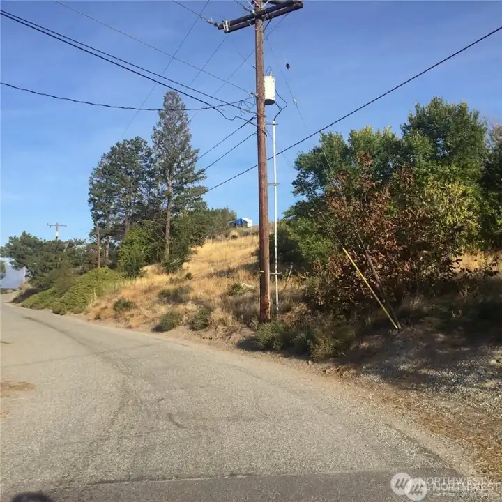 On the N side of Riverview Cemetery Rd, view travelling toward the West.